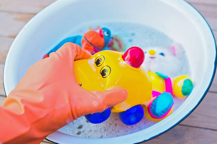 Wash toys and objects that a toddler takes in mouth