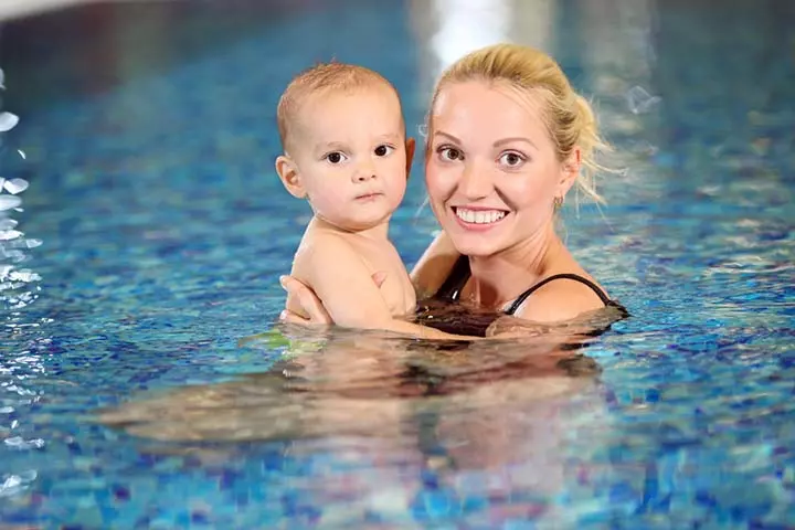 While in the water, hold them in your arms at all times 