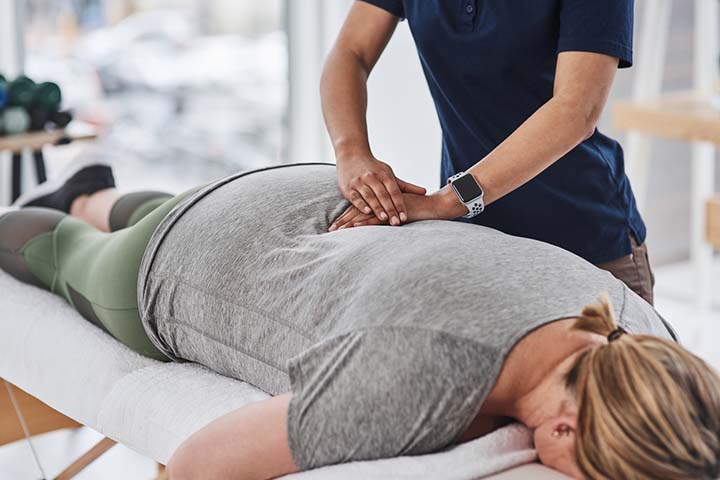 You may see a chiropractor for back pain after pregnancy