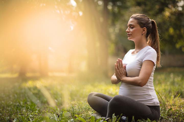 Indulge in yoga in 9th week of pregnancy
