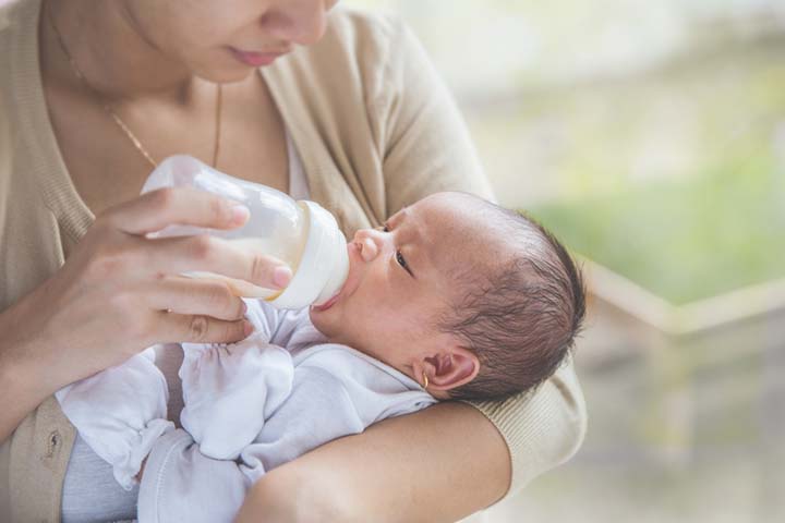 You may burp the baby after they are halfway done with the bottle