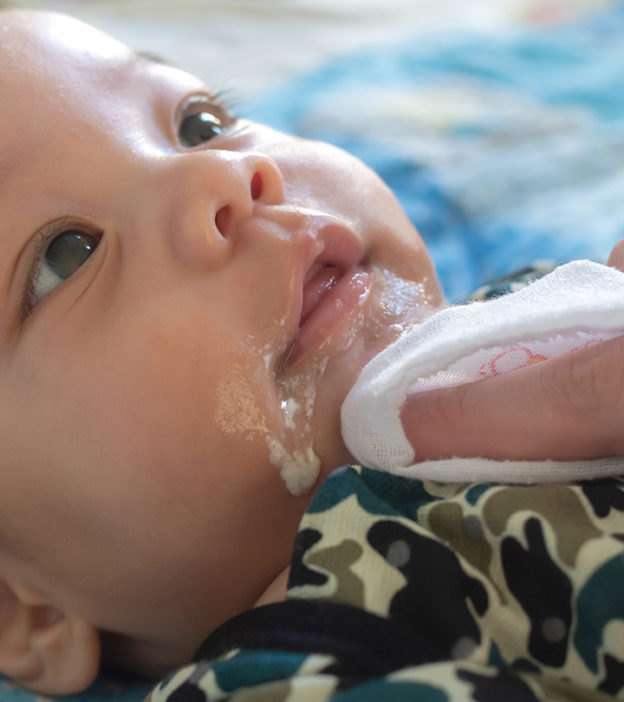 All You Need To Know About Your Baby Spitting Up