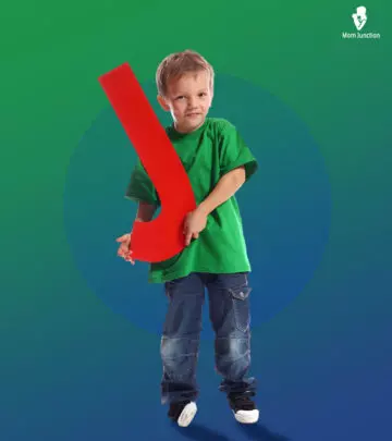 A girl riding a small toy car