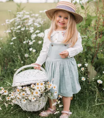 A cute baby in a white dress