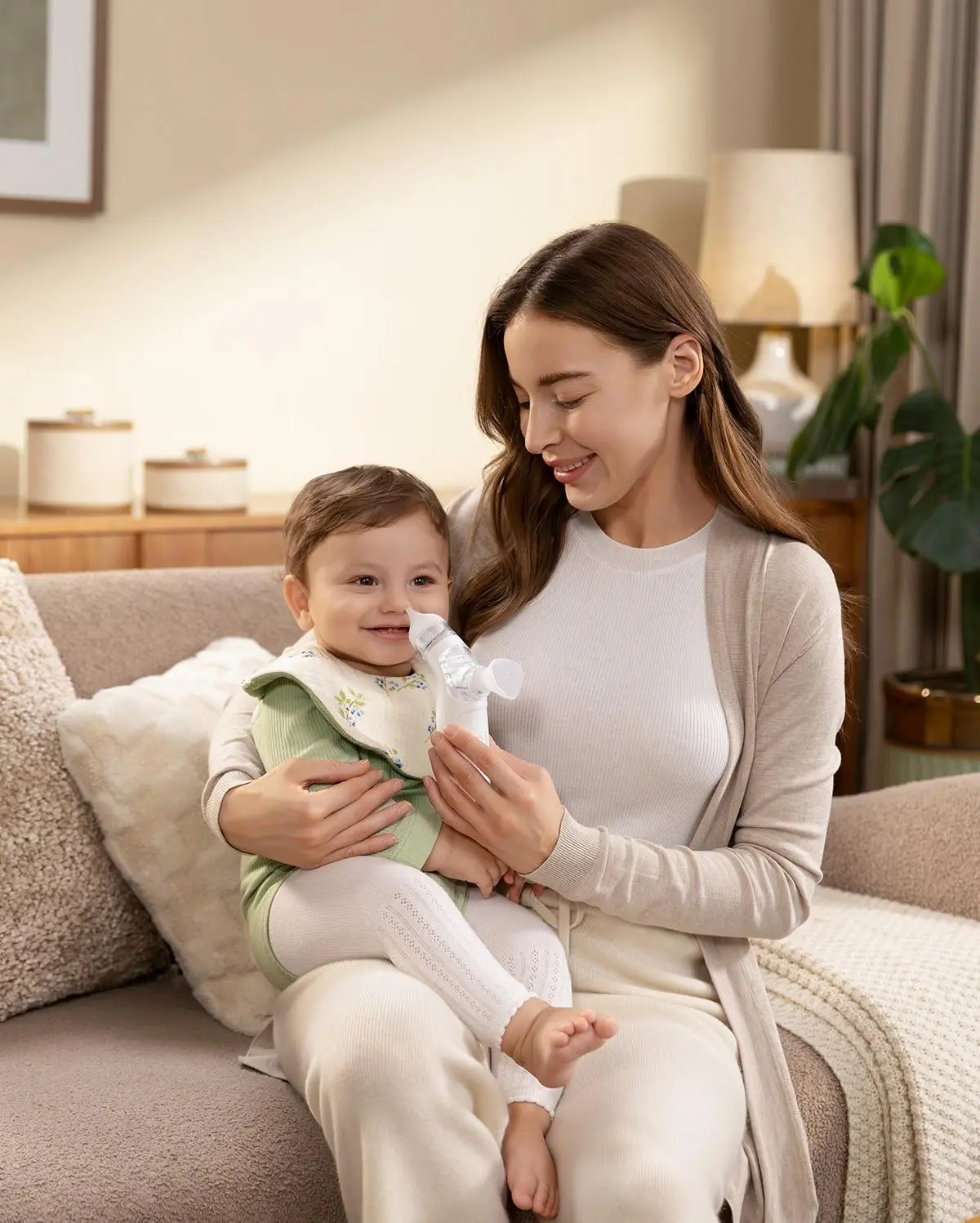 Momcozy 2-In-1 Electric Nasal Aspirator: A Review for Parents A woman and her toddler on an outdoor adventure with the Momcozy ChangeGo Stroller